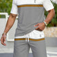 Zweiteiliges Kurzarm-Set für Herren im Colorblock-Look, lässige Sommer-Sportbekleidung, schlichte Strandmode, zeitgemäßer, figurbetonter Stil, lässiges Sportoutfit