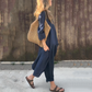 Zweiteiliges Set aus Oberteilen und Hosen mit einfarbigem High-Low-Saum