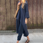 Zweiteiliges Set aus Oberteilen und Hosen mit einfarbigem High-Low-Saum