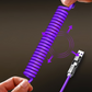 Kompaktes 4-in-1-Auto-Ladekabel mit Aufrollmechanismus